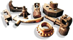 Fully machined connections in copper based alloys made with sand casting process